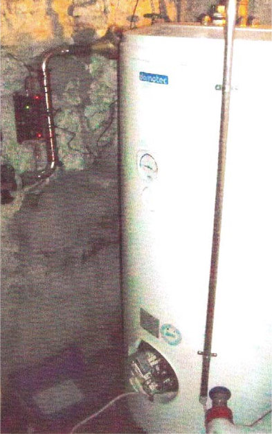 homeowner Lessoc remove hard water limescale minerals hot water tank installed